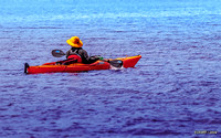 Man with Fishing Rod Kayaking