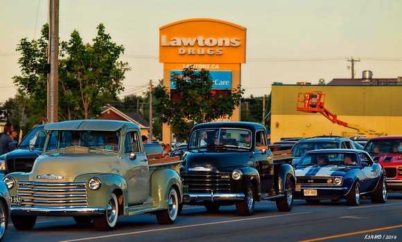 1951 & 53 Chevy pickups cruise by