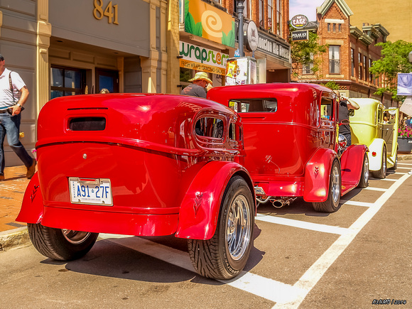 Hot Rods Parked On Main Street