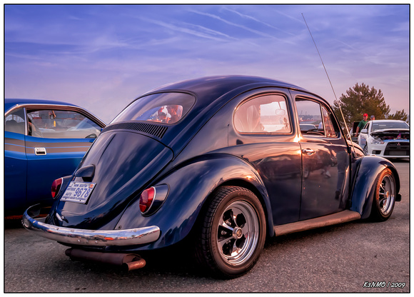 Vintage VW Beetle at sunset