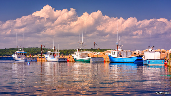 Five Fishing Boats Docked at the Wharf