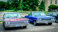 A pair of Dodges - 1965  Polara (red) & 1966 Monaco (blue)