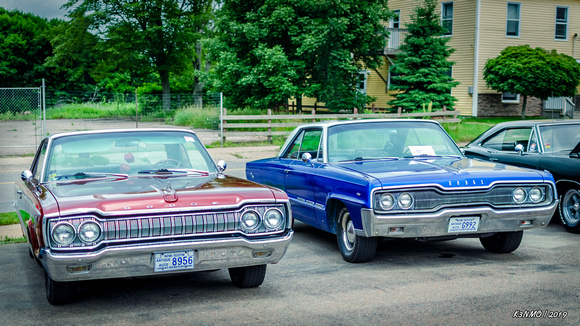 A pair of Dodges - 1965  Polara (red) & 1966 Monaco (blue)